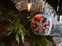 A bell for sheep and goats from Spain serves as a pretty Christmas tree ornament